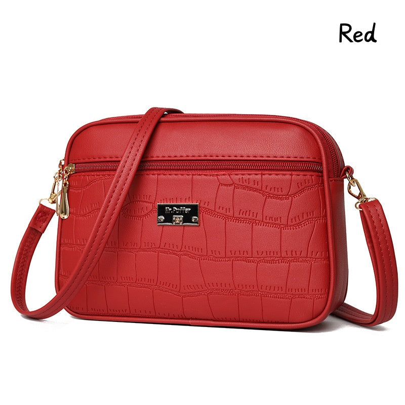 đDivatos, egyszerƱ nĆi crossbody tĂĄska